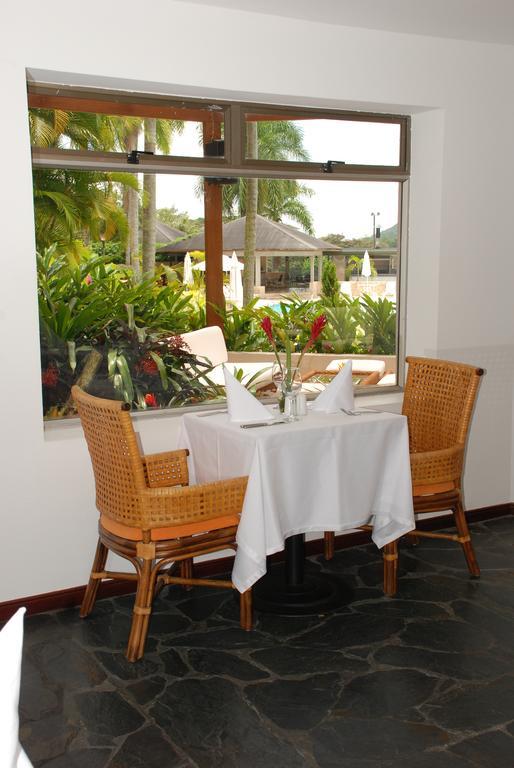 Hotel Estelar Altamira Ибаге Экстерьер фото A table set for two