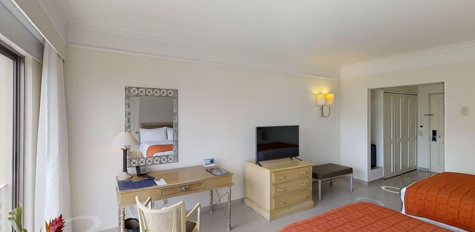 Hotel Estelar Altamira Ибаге Экстерьер фото A room at the hotel