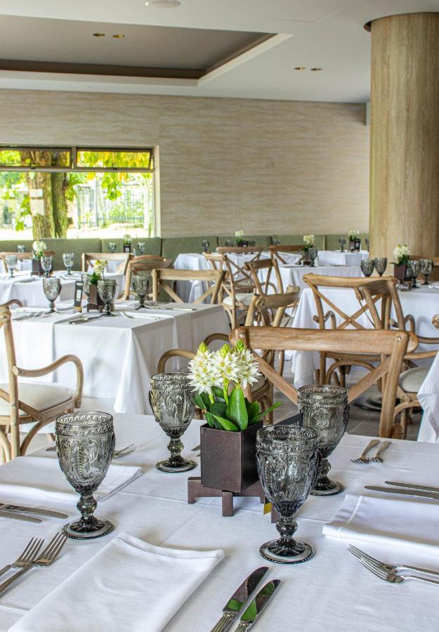 Hotel Estelar Altamira Ибаге Экстерьер фото The interior of the restaurant
