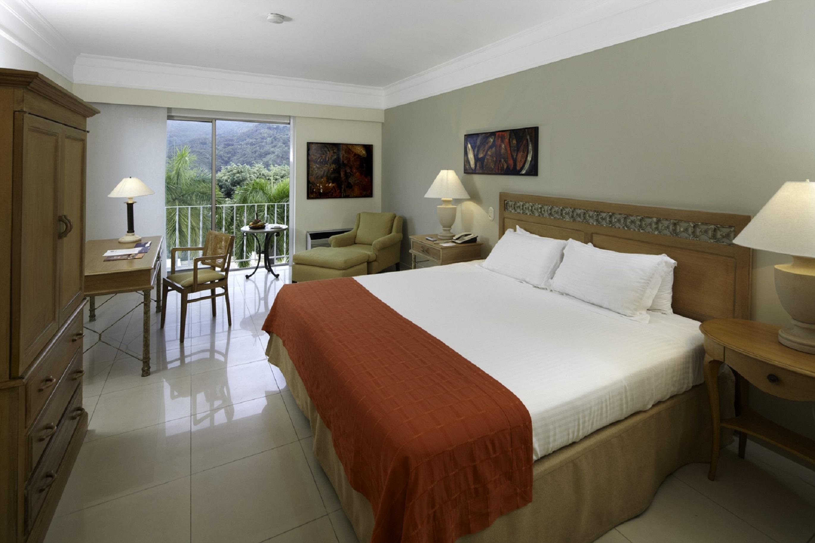 Hotel Estelar Altamira Ибаге Номер фото A room at the hotel