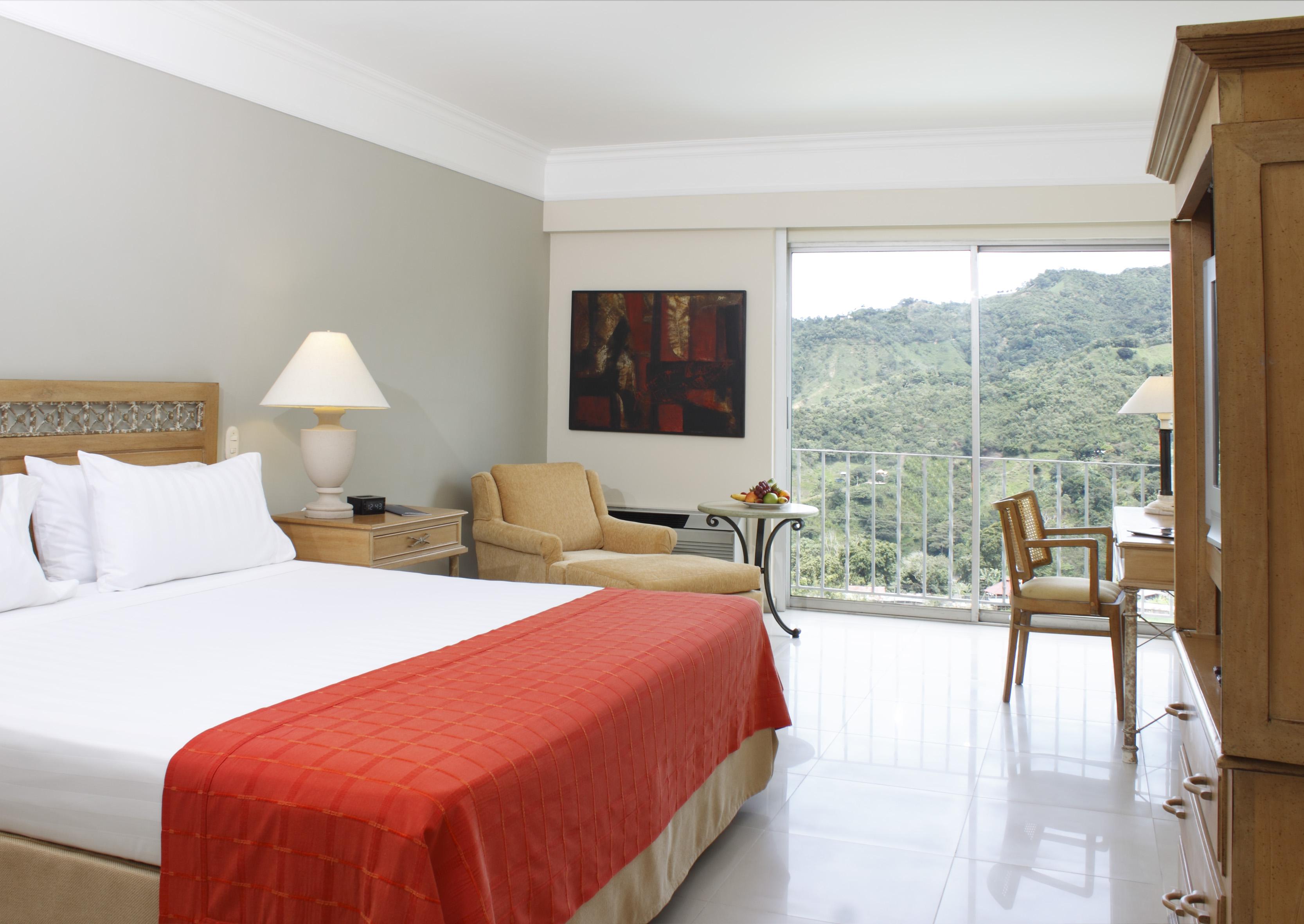 Hotel Estelar Altamira Ибаге Экстерьер фото A room at the hotel