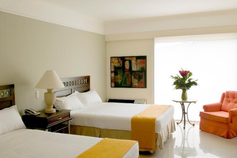 Hotel Estelar Altamira Ибаге Номер фото A room at the hotel